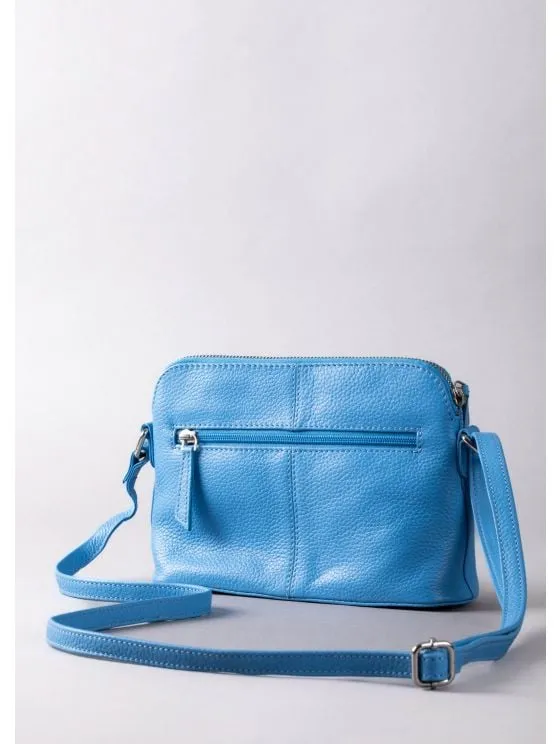 Alston Curved Leather Cross Body Bag in Blue