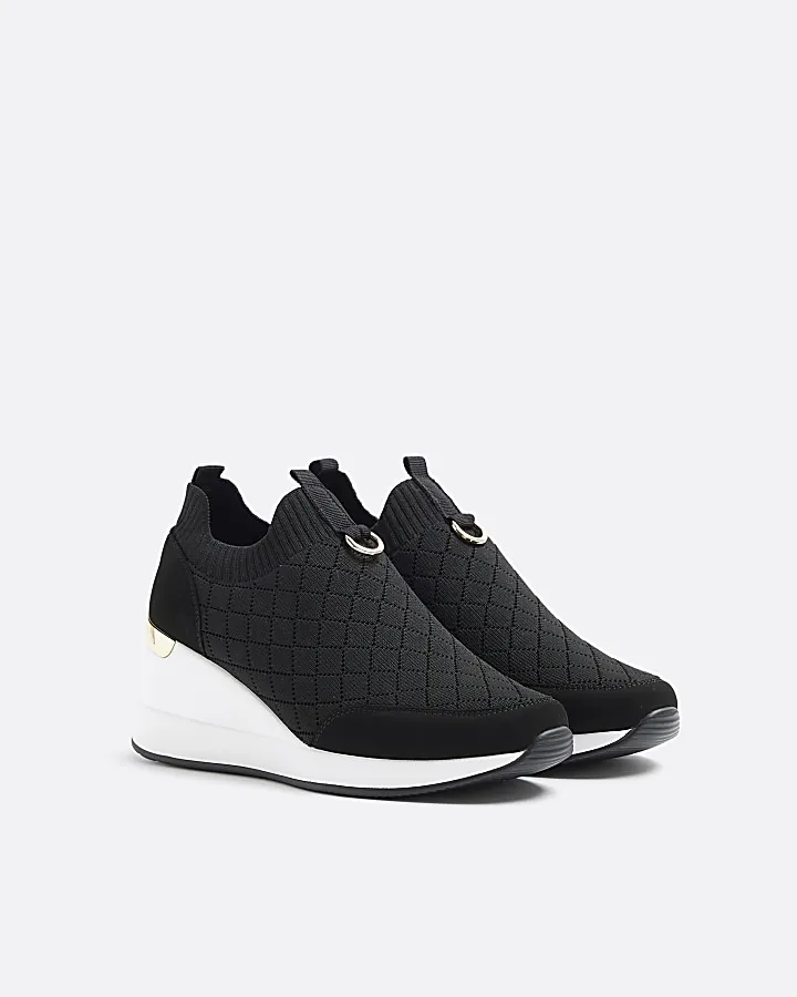 Black wide fit quilted wedge trainers
