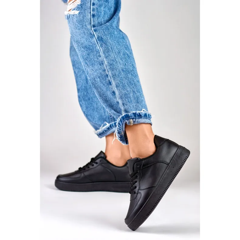 Classic black sports sneakers with a black sole
