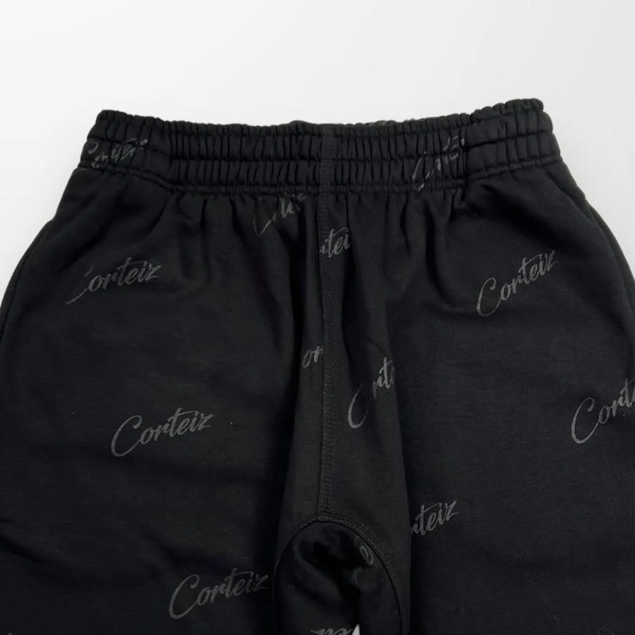 Corteiz Script / All Over Print Joggers In Triple Black