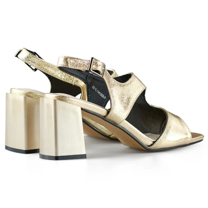 Elegant women's golden high-heeled sandals