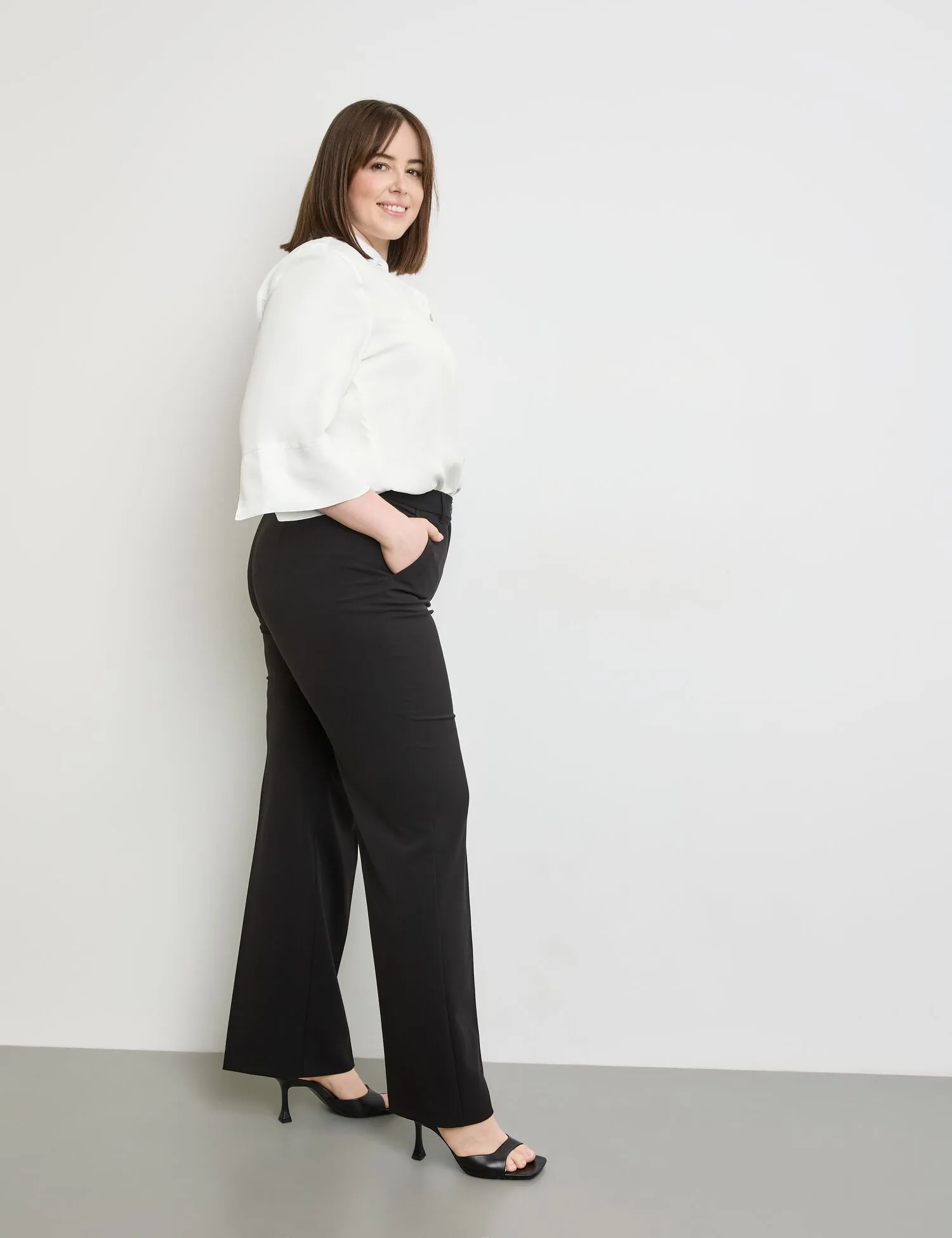 Smart pressed pleat trousers with a wide leg, Carlotta