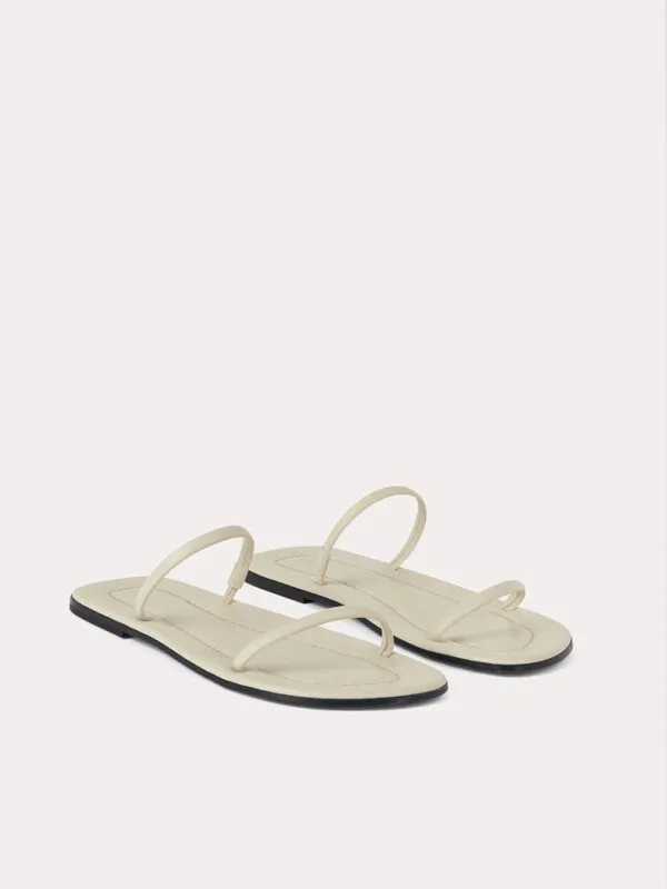 Toteme The City Slide Sandals | Luxury and style at your fingertips